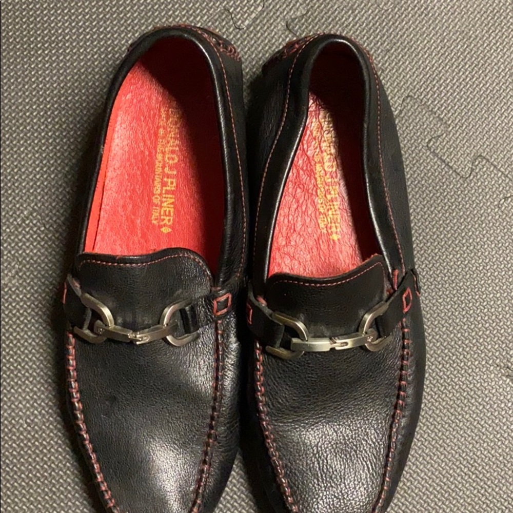 Donald J Pliner black loAfers with silver bit.